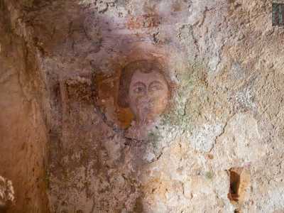 ...e frammenti di figure di altri santi